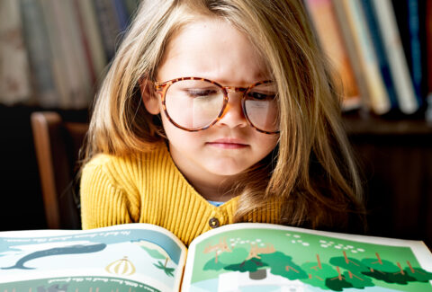 adorable-little-girl-with-glasses-getting-stressed-out